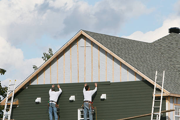 Professional Siding technician working in Fulton, TX